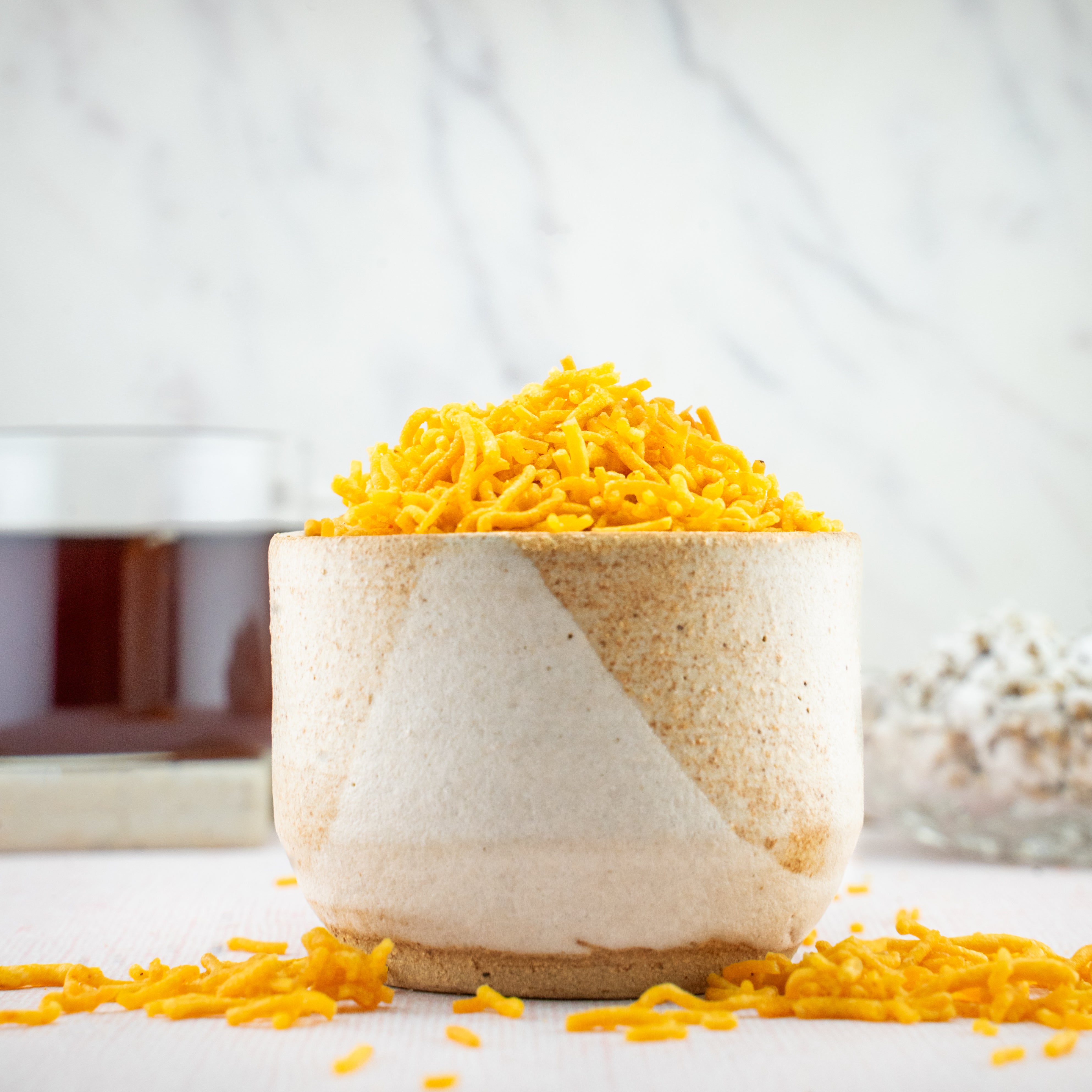 Bhuja Namkeen snack blend with spices in eco-friendly, rustic packaging