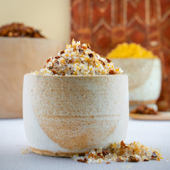 Chili garlic salt blend in spice jar with bold, spicy red seasoning