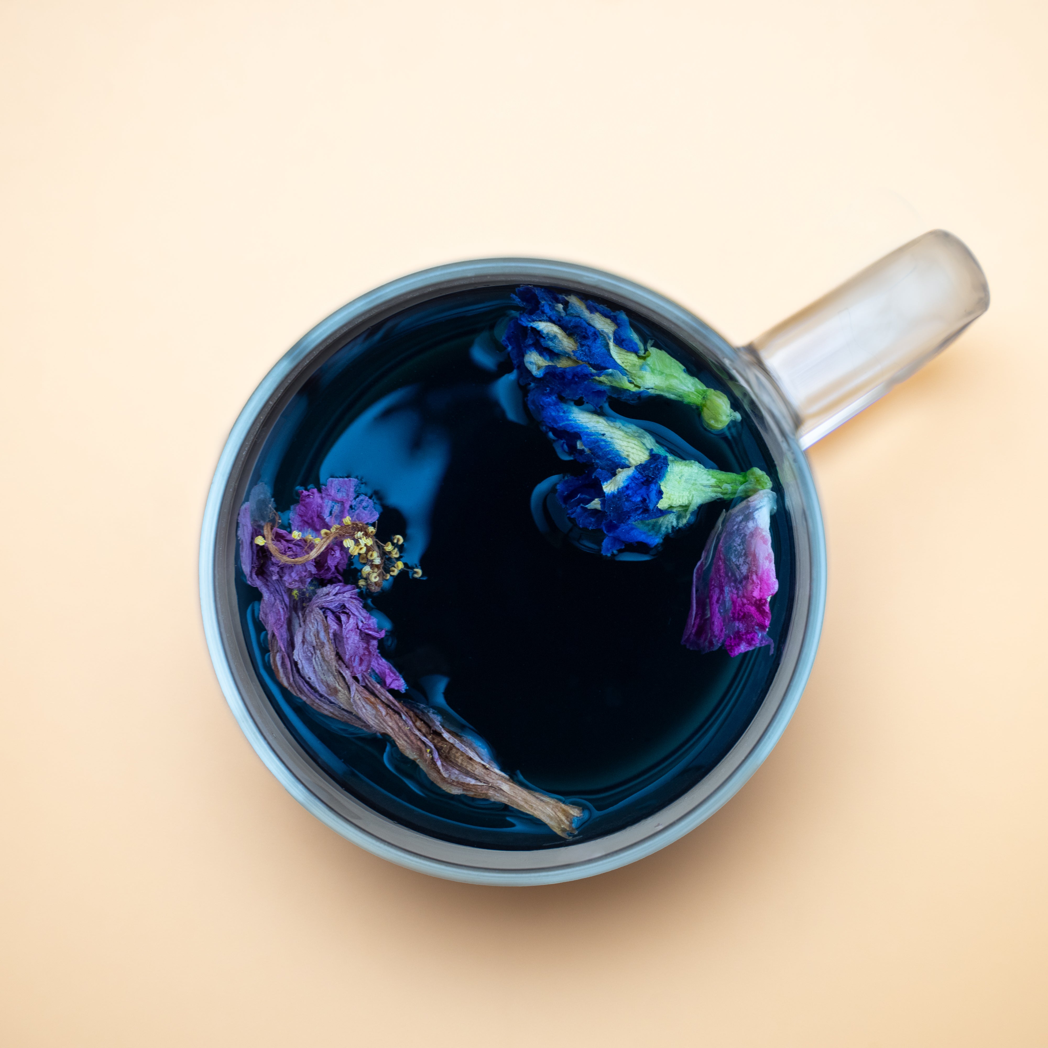 Floral Fantasy loose tea with colorful blend of petals and herbs in natural light