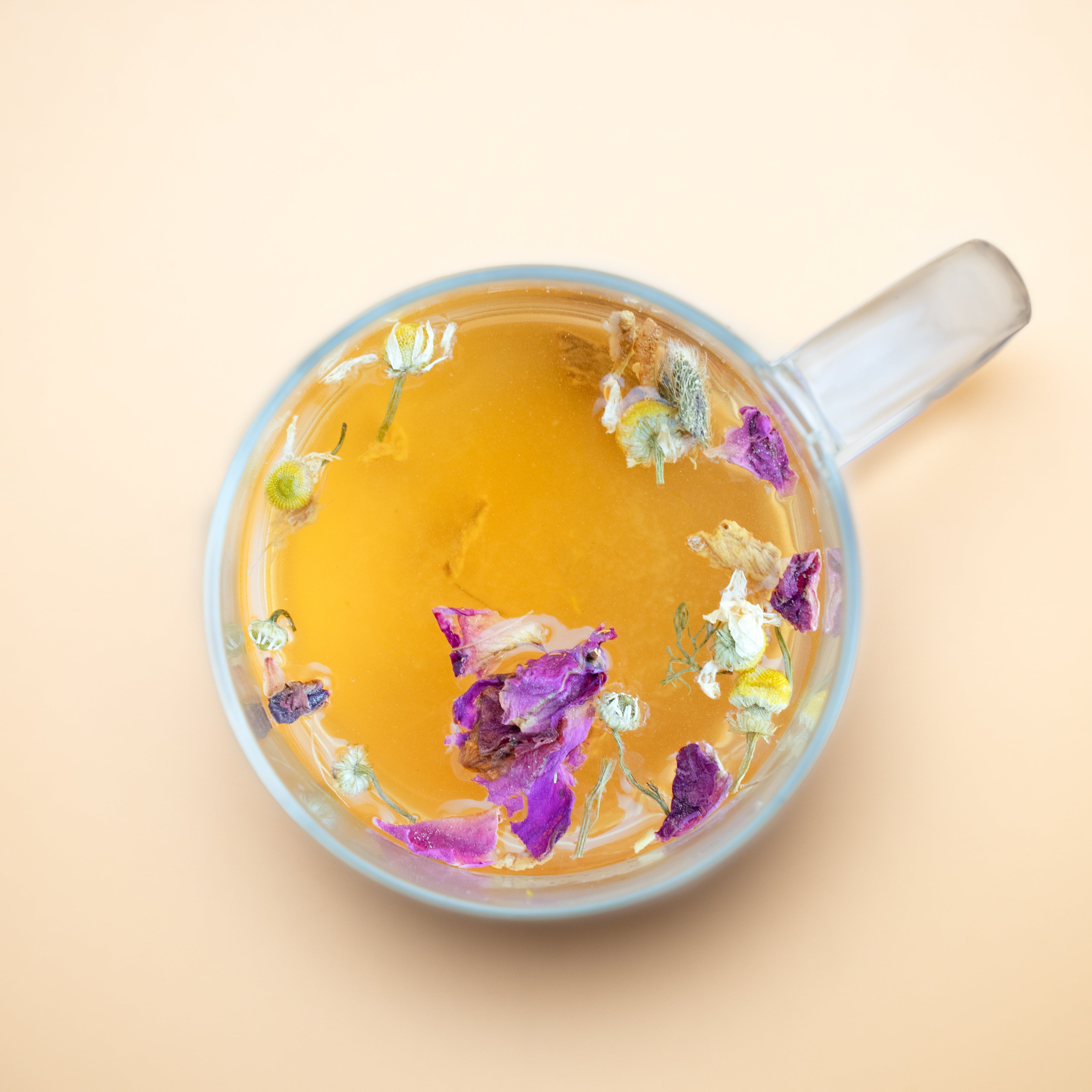 Ginger, Basil, Green Tea loose leaf blend in earthy, natural tones