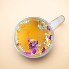 Ginger, Basil, Green Tea loose leaf blend in earthy, natural tones